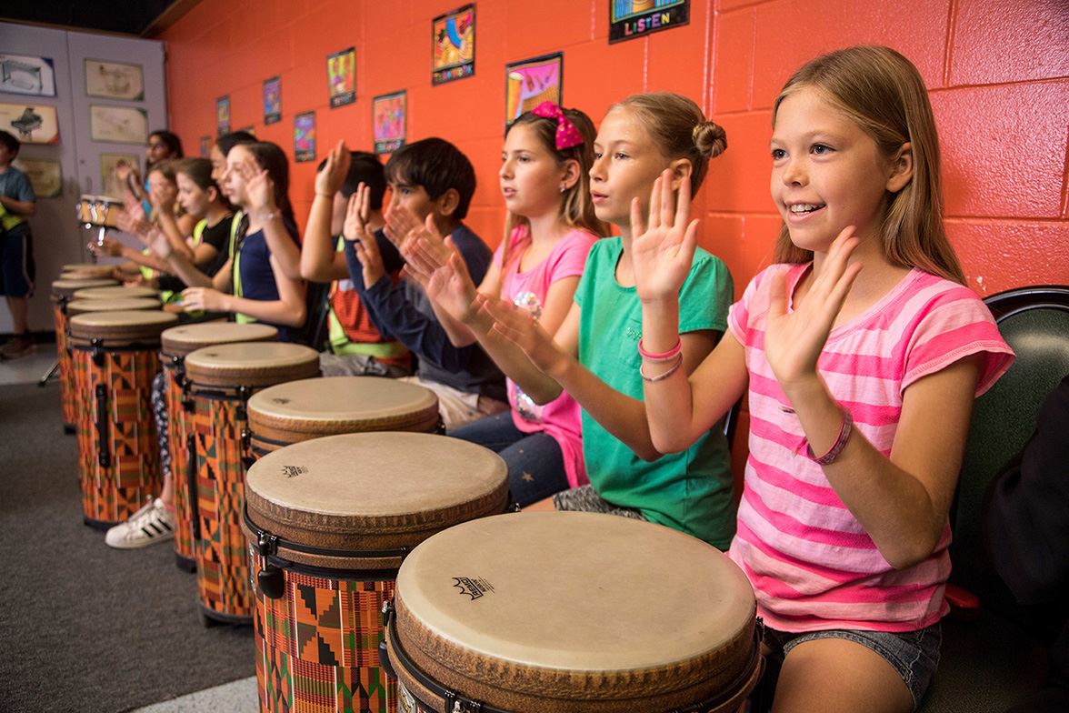 students playing bongo drums